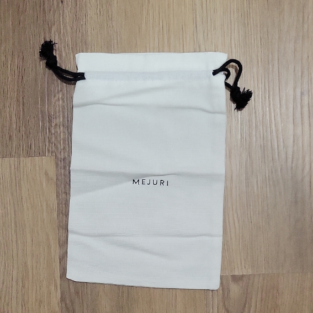 Mejuri White Pouch with Black Drawstrings